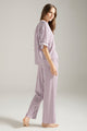 Pijama pantalón, camisa manga corta con botones, en rayas color lila